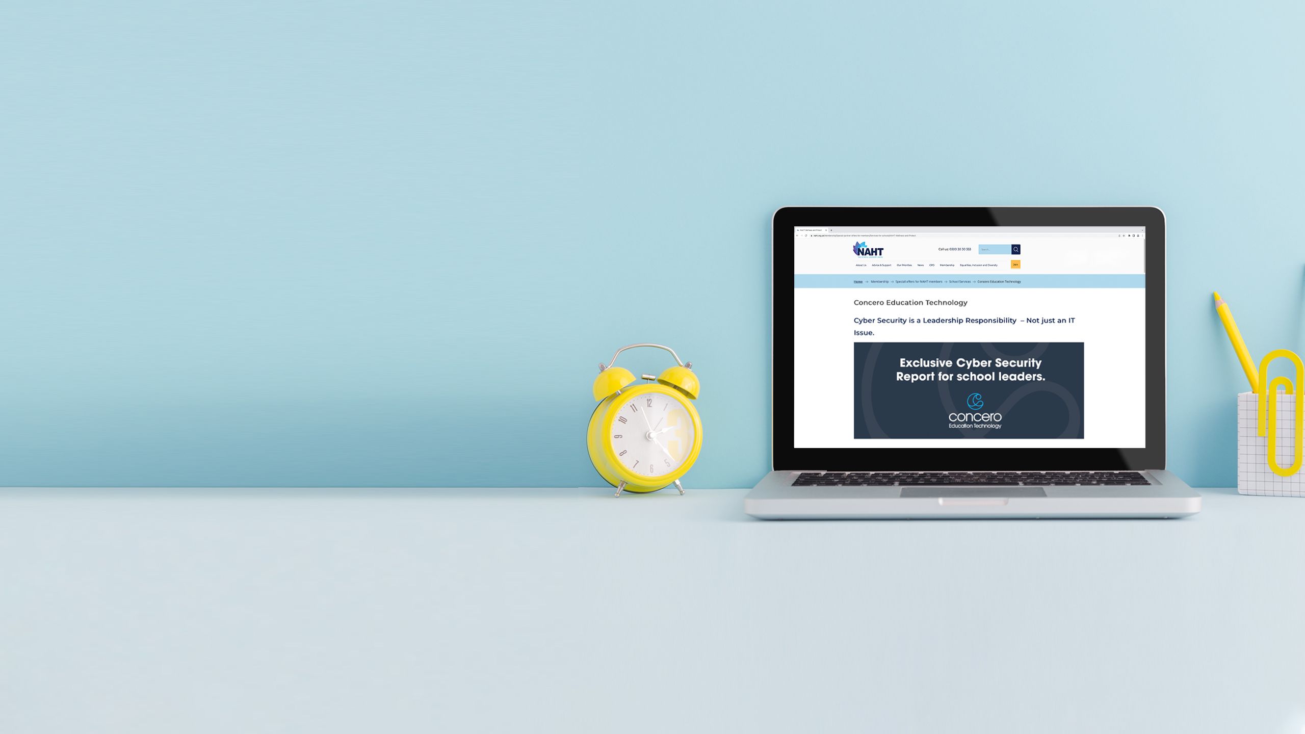 Laptop on a desk displaying homepage screens of relevant partner websites.